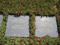 Stone tablets each bear the names and dates of two soldiers, if know