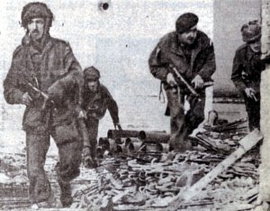 British paratroopers search a ruined house in Oosterbeck